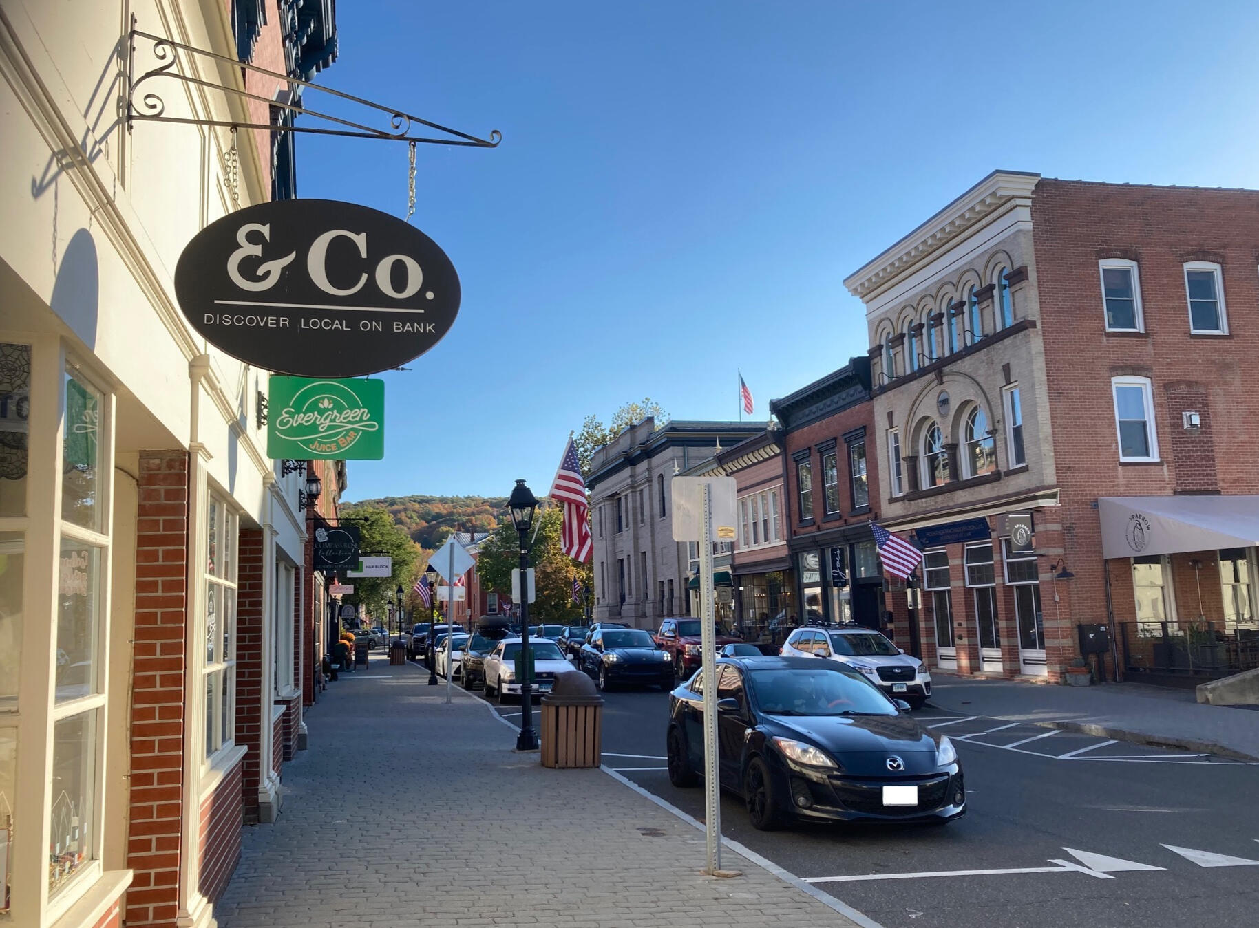 Bank Street in New Milford, CT Iconic Bank Street in downtown New Milford, CT. Picture from October 2024, copyright Baldwin Hills LLC.